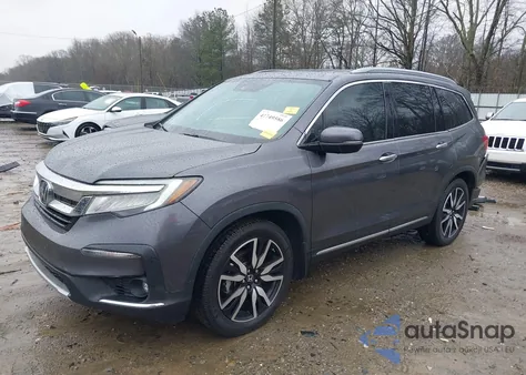 2021 Honda Pilot 2Wd Touring 8 Passenger from USA, damaged, VIN 5FNYF5H9XMB014190